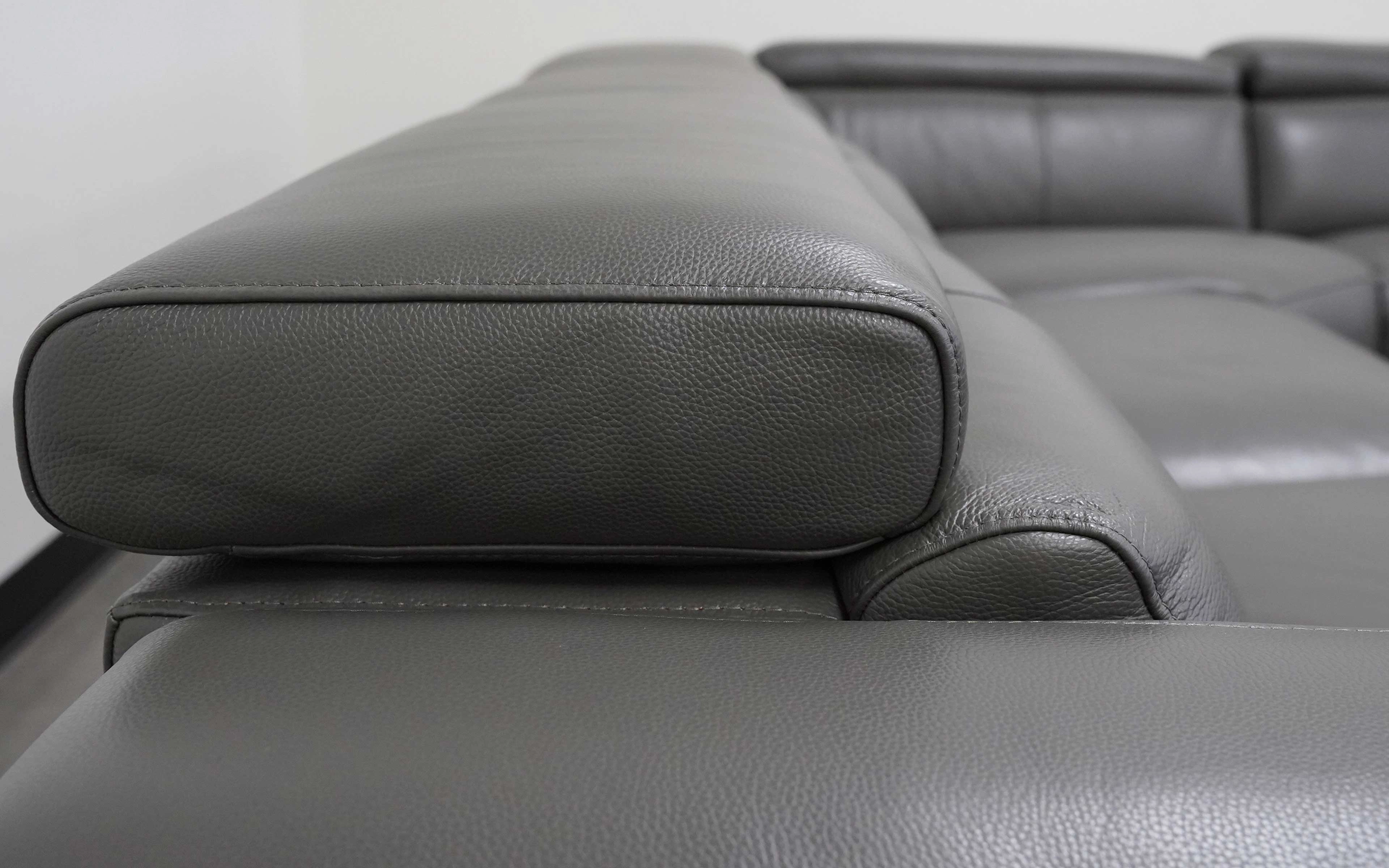 Mirage Reclining Sectional With Adjustable Headrest