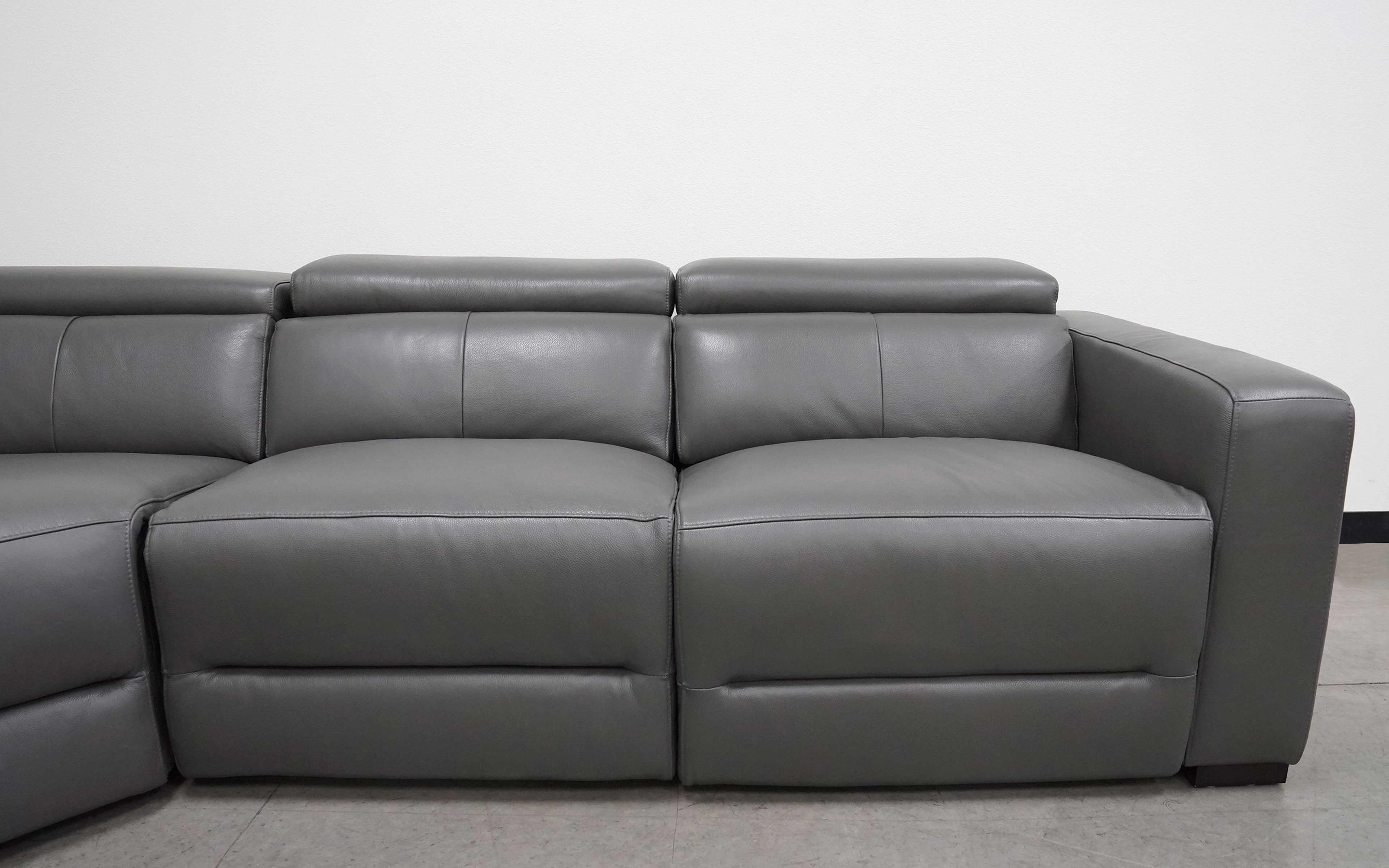 Mirage Reclining Sectional With Adjustable Headrest