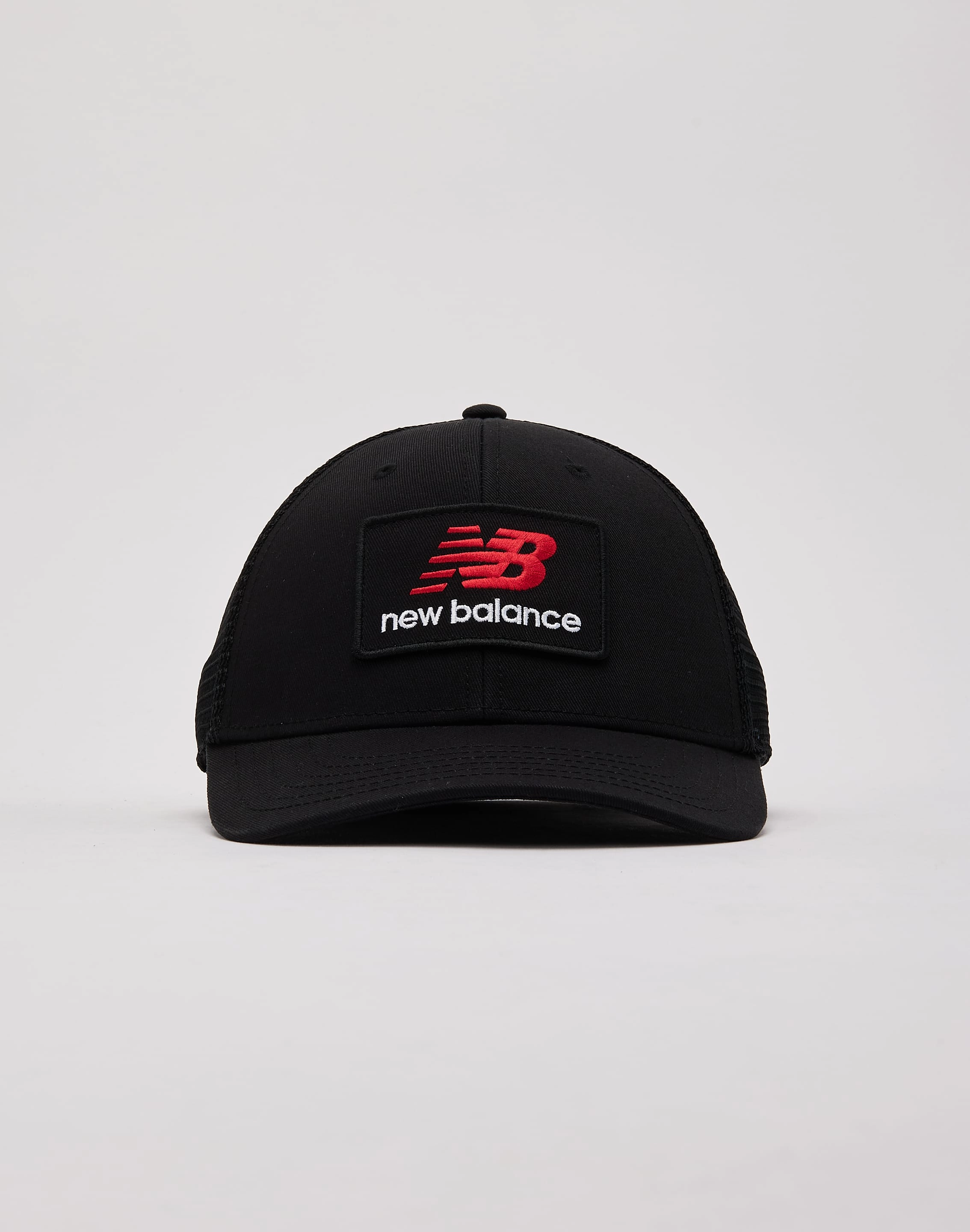 New Balance Stacked Patch Logo Trucker Hat
